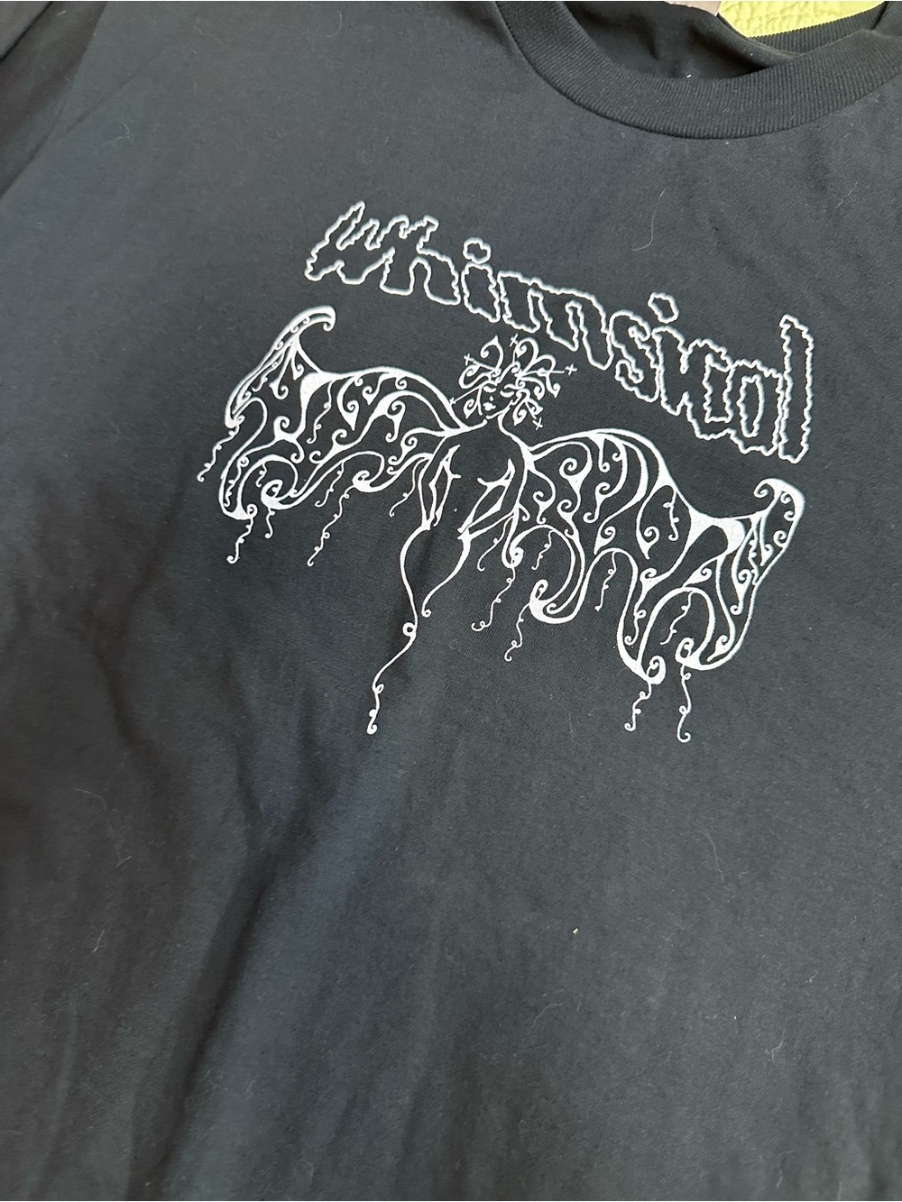 100% cotton. Black Graphic Tee with White Angel Design
